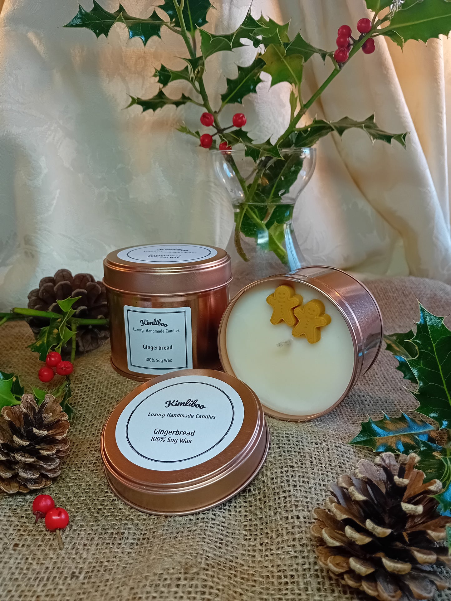 Large rose gold tin with gingerbread fragranced candle and two gingerbread man wax decorations