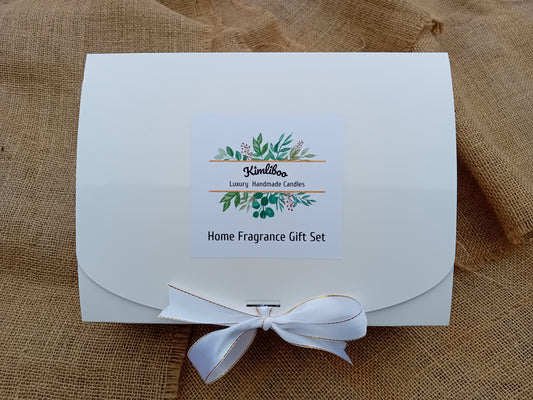 White box with white and gold bow