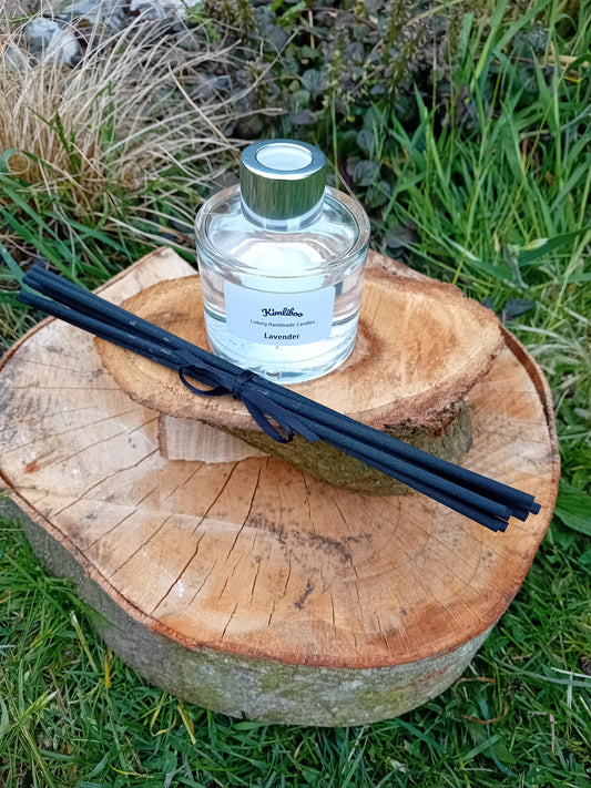 Lavender fragranced reed diffuser in a 100ml circular jar with silver cap and 7 black reeds.