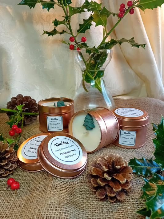 Small rose gold tin with Christmas Tree fragranced candle and one Christmas Tree wax decoration