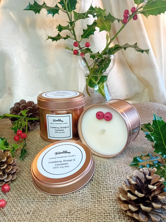Large rose gold tin with Cranberry, Orange & Cinnamon fragranced candle and two cranberry wax decorations