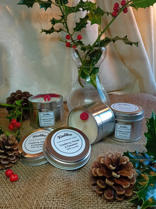 Small silver tin with Cranberry Orange & Cinnamon fragrance and one cranberry wax decoration
