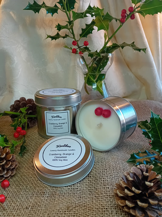 Large silver tin with Cranberry Orange & Cinnamon fragranced candle and two cranberry wax decorations 